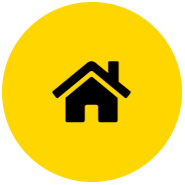 Siluetta av ett litet hus med skorsten med gul bakgrund